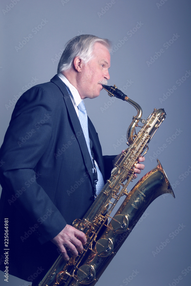 Fototapeta premium Older man with a saxophone