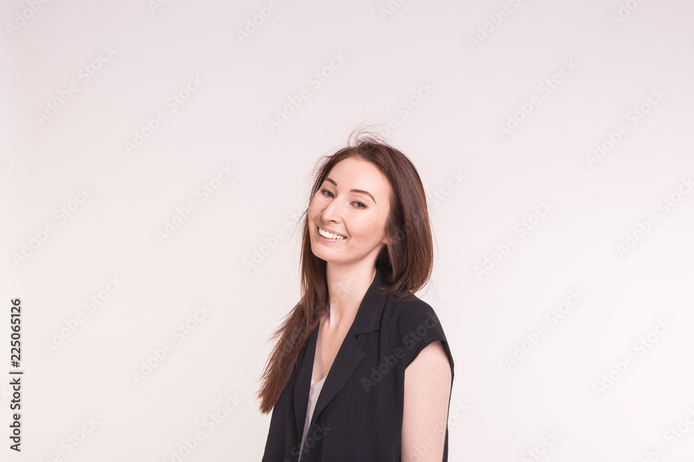 Fashion, style and people concept - pretty young asian woman over white backgroung with copy space Fashion, style and people concept - pretty young asian woman over white backgroung with copy space