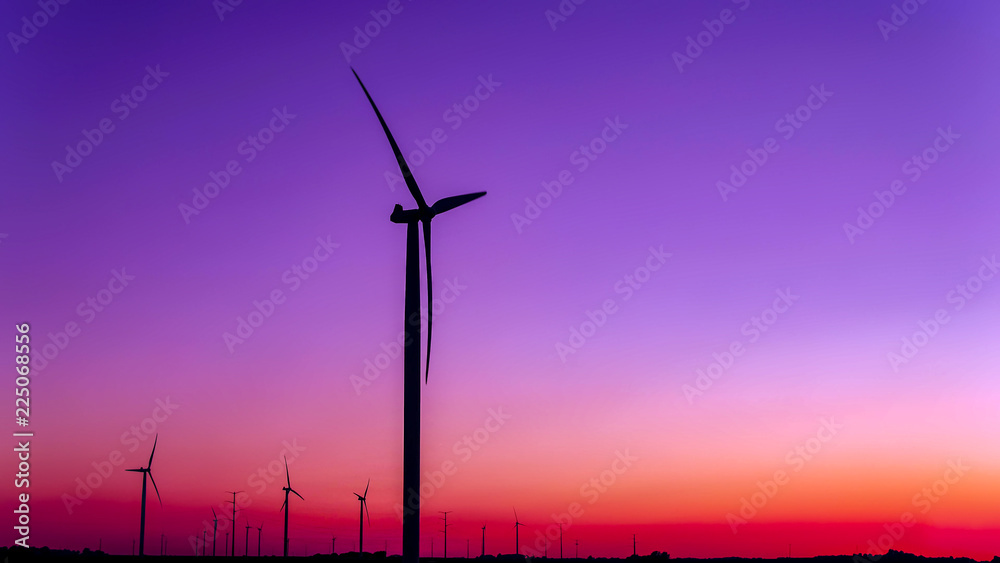 Wind power generation, Wind turbines on farmland with sunset