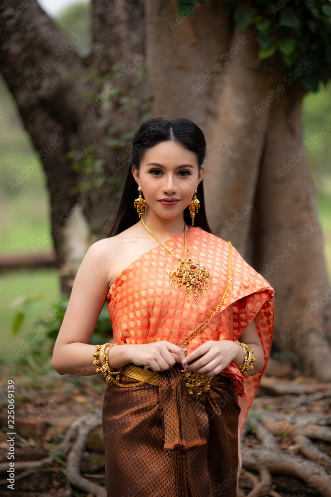 Portrait Of Beautiful Woman In Traditional Clothing Portrait Of Beautiful Woman In Traditional Clothing