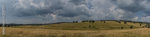 Summer meadows near Prebuz town before storm