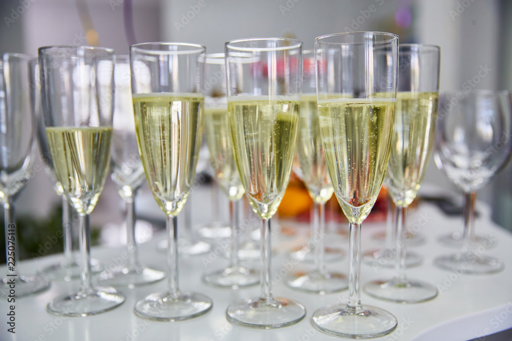 Glasses with champagne close-up, bubbles of champagne Glasses with champagne close-up, bubbles of champagne