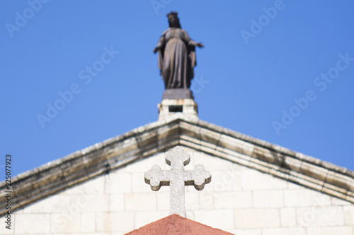 Cross with virgin Mary, closeup, for religious, spiritual themes