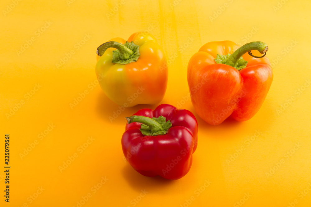 Sweet bell pepper on a colored background. Studio light. Top view Sweet bell pepper on a colored background. Studio light. Top view