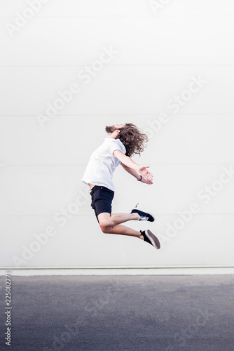 Young man in midair jump
