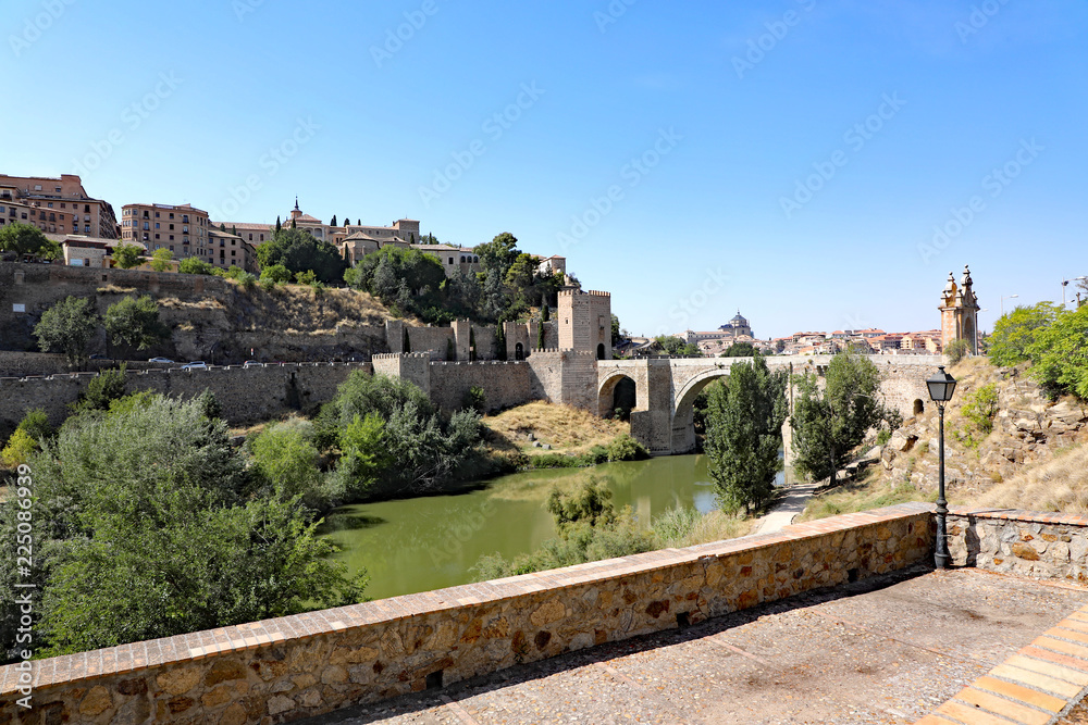 The historic Alcantara Bridge over the Targus River built by the Romans in the 9th century, in Toledo, Spain.