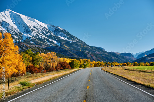 Highway at autumn in Colorado, USA.
