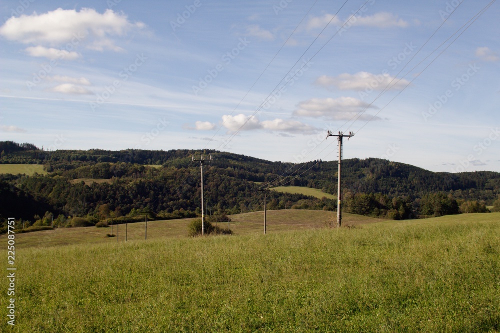 Fototapeta premium Pylon high voltage power lines, wires leading electrical current.