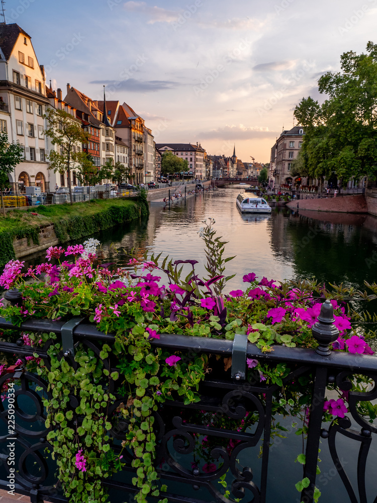 View along the Ill River in historic areas of Strasbourg in the Alsace region of France. 