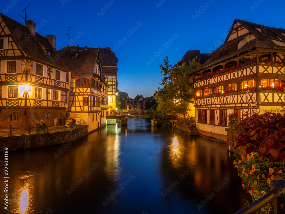 Sunset along the Ill River in Petite France areas of Strasbourg in the Alsace region of France. 
