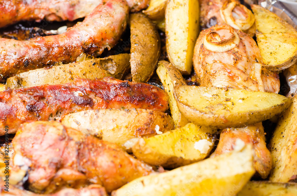 potatoes, slices of grilled sausages