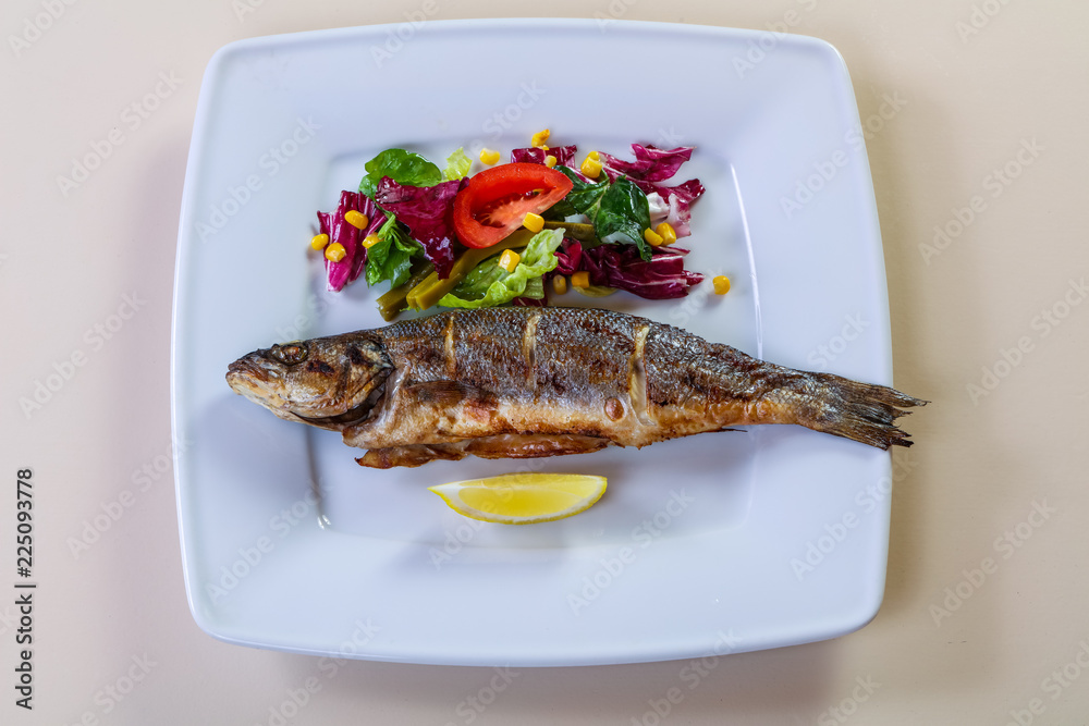 Grilled seabass with lemon