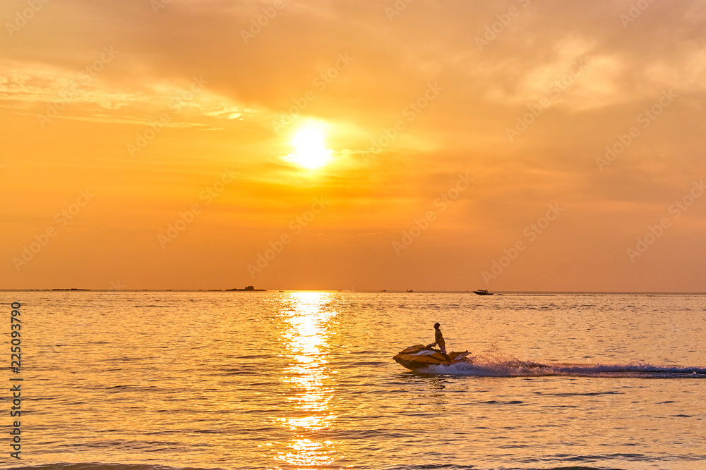 Water bike at sunset ocean bay view