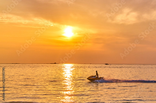 Water bike at sunset ocean bay view © Alexey Pelikh