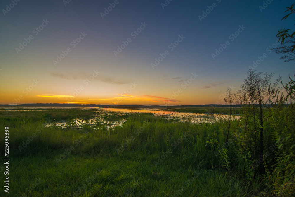 sunrise over the water