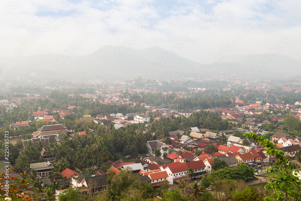 The city of Luang Prabang in Laos viewed from above from the Mount Phousi (Phou Si, Phusi, Phu Si) on a sunny day.