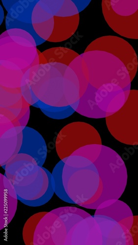 Multicolored translucent circles on a dark background. Vertical image orientation. 3D illustration