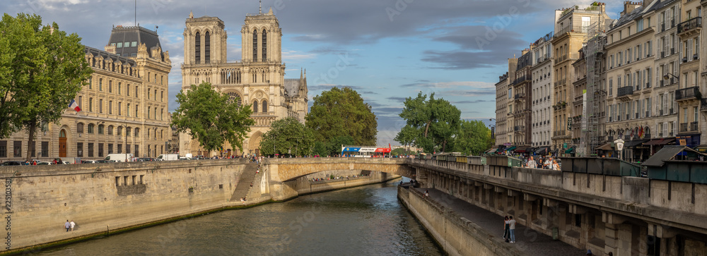 View along the Seine River in Paris looking toward Notre Dame Cathedral.