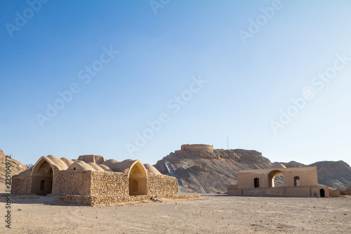 Towers of Silence in Yazd, Iran, in the middle of the desert. Also known as Dakhma, These towers were used in the Zoroastrian religion to dispose of the bodies of their deceased ones.