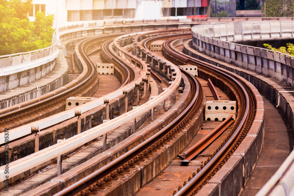 Fototapeta premium Skytrain railroad tracks with building background.