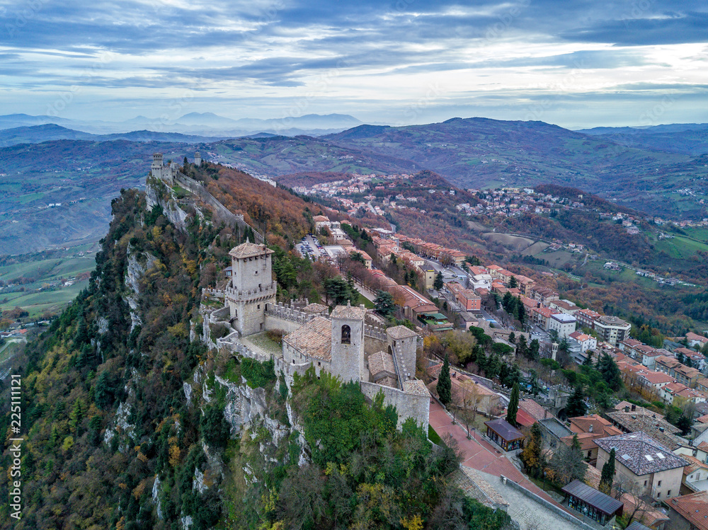 San Marino aerial city scape with castles, walls, towers, houses and red rooftops 