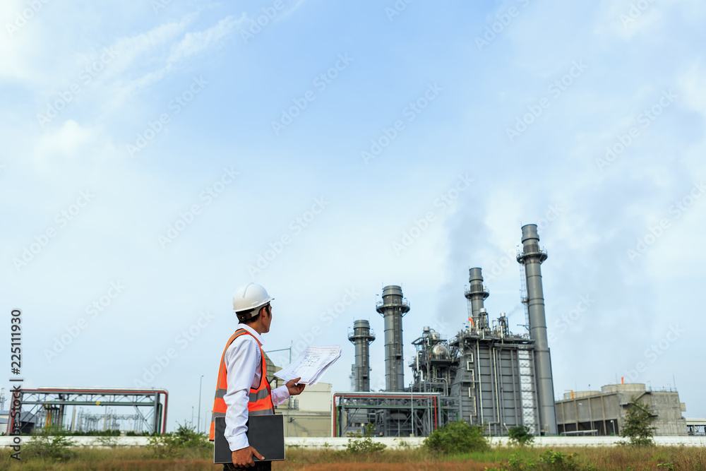 Engineer is checking plant around Gas turbine electrical power plant
