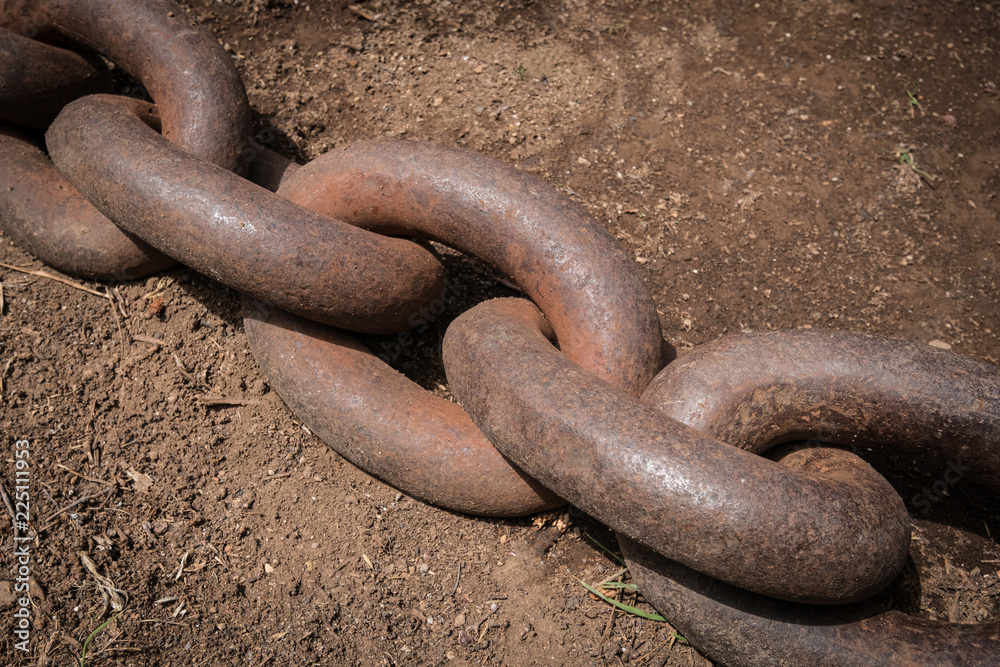 big rusty chain on floor closeup - anchor chain big rusty chain on floor closeup - anchor chain
