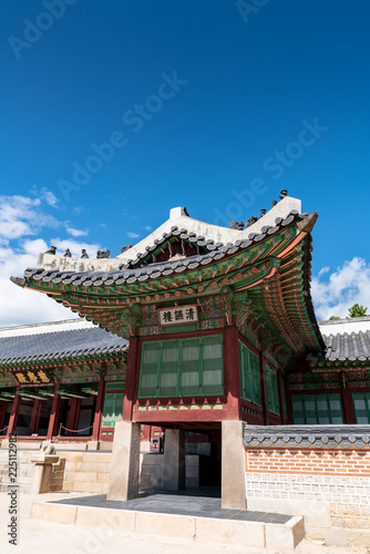 The Korea traditional architecture have a beauty of both colorful and curve under blue and high sky in autumn. Here is Gyeongbokgung Palace where is one of the famous places to tourist who visit Korea © sulccojang