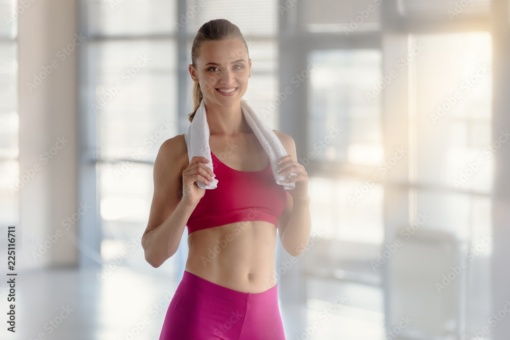 Fitness woman with towel