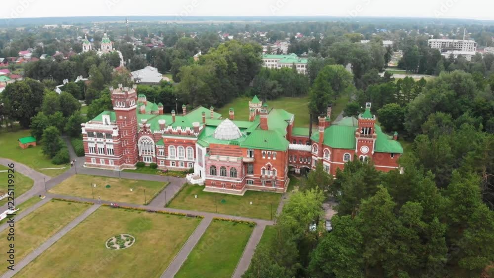 Sheremetev castle palace and park ensemble in the village of Yurino on the bank of the Volga, combination of different architectural styles in one building. Cloudy weather at the beginning of summer. Sheremetev castle palace and park ensemble in the village of Yurino on the bank of the Volga, combination of different architectural styles in one building. Cloudy weather at the beginning of summer.