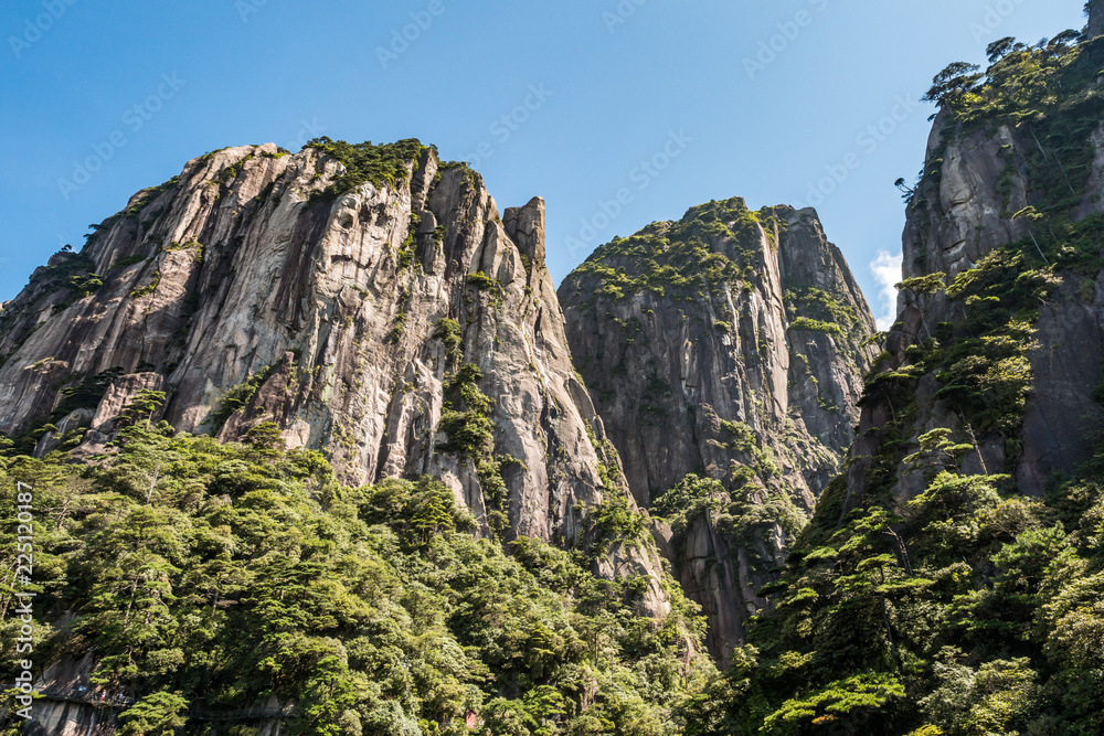 stunning rock formation at the peaks of Mount SanQiang on a sunny day