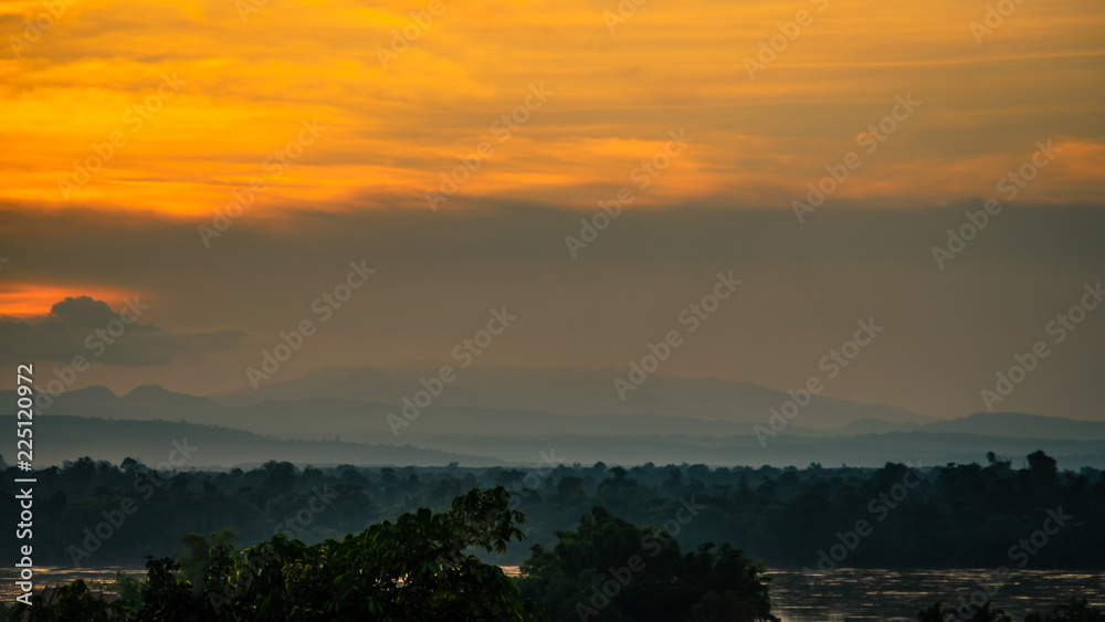 Scenic view of mountains against sky during sunset image