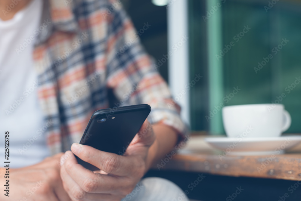 Man using smartphone Man using smartphone
