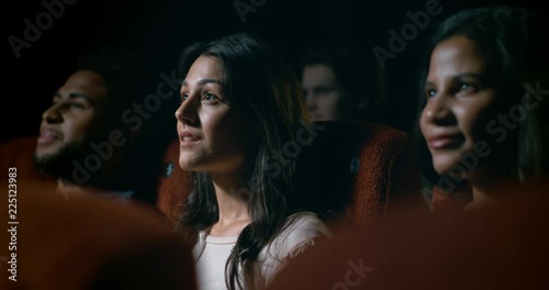Movie theatre audience watching a movie
