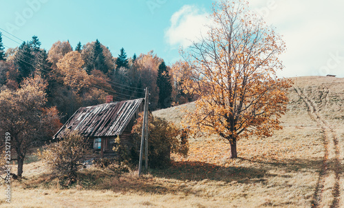 Old abandoned farm house under the hill