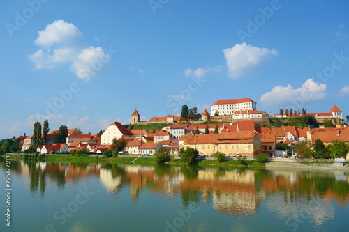 Ptuj, Slovenia, is the oldest city in Slovenia with a castle overlooking the old town from a hill and the Drava river beneath