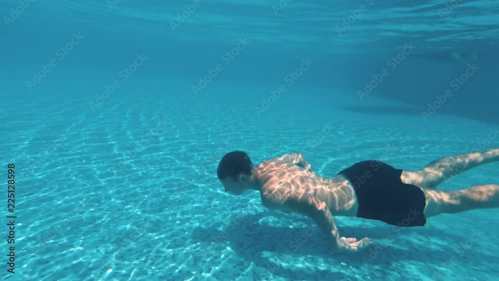Happy young man at swimming pool. Happy young man at swimming pool.