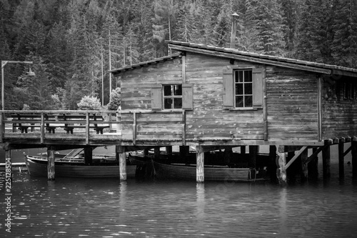 old pier at lake of Braies in black and white