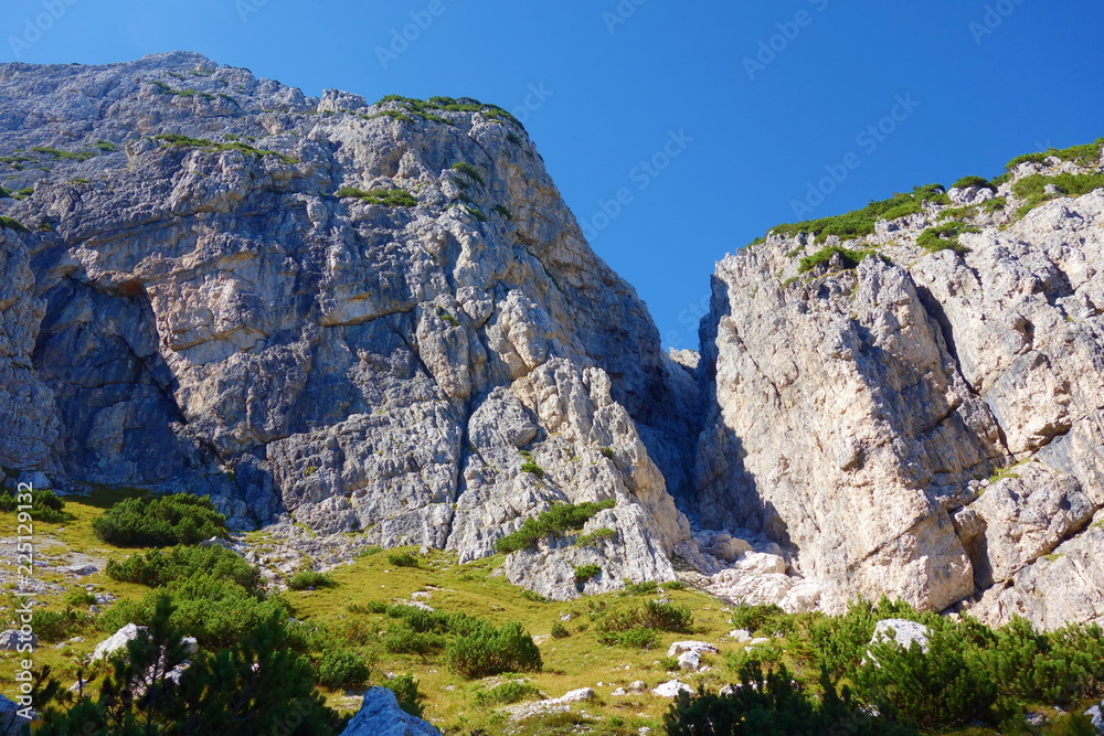 Hiking trail leading from Lago del Predil to Bivacco Gorizia and Cima delle Forcelle in Dolomites, Alps, Italy