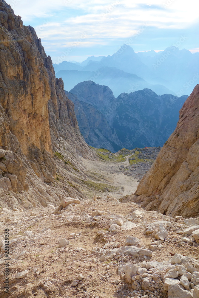 Mountain pass in Dolomites leading to the top of Cima delle Forcelle in Alps, Italy