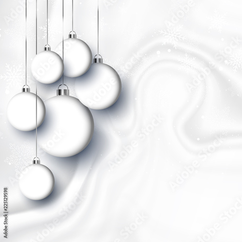 Hanging Christmas baubles on a white marble style texture