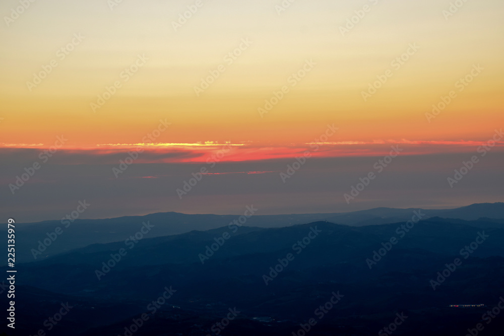 The capturing of the sunrise on the mountain chain Gran Sasso located in the National Park Gran Sasso in Prati di Tivo, Teramo province, Abruzzo region, Italy The capturing of the sunrise on the mountain chain Gran Sasso located in the National Park Gran Sasso in Prati di Tivo, Teramo province, Abruzzo region, Italy