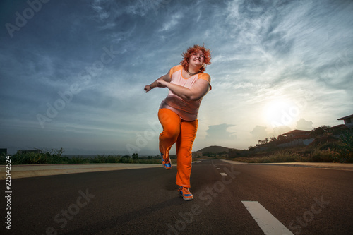 Beautiful young fat woman is runing