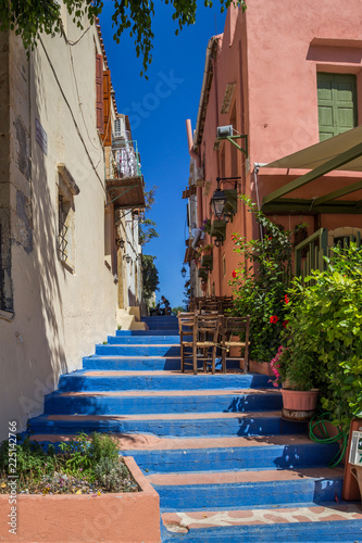 Fototapeta Naklejka Na Ścianę i Meble -  Blue steps of a small street in Rethymno, Crete