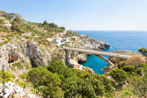 Fototapeta Naklejka Na Ścianę i Meble -  Apulia, Leuca, Grotto of Ciolo - Country road bridge of Grotto Ciolo