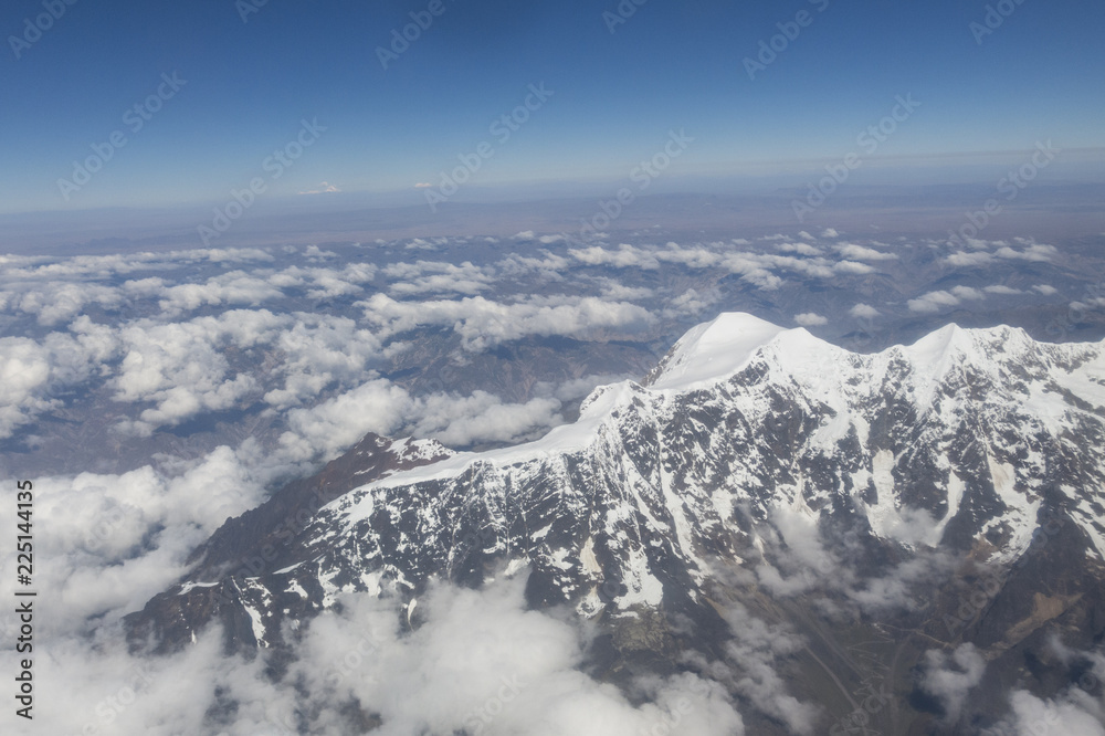 Cerro Tiquimani, Huayna Potosi. The Cordillera Real is a mountain range in the South American Altiplano of Bolivia.