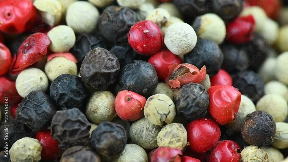 Pepper mix. Black, red and white peppercorns rotation Pepper mix. Black, red and white peppercorns rotation