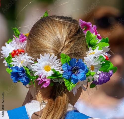 Wreath of flowers on the head of a girl