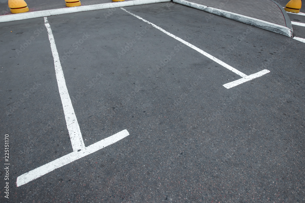 Parking, marking on the asphalt parking spaces. The concept of a lack of parking in megacities, paid parking. copy space