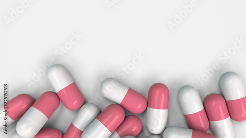 Pile of white and red medicine capsules